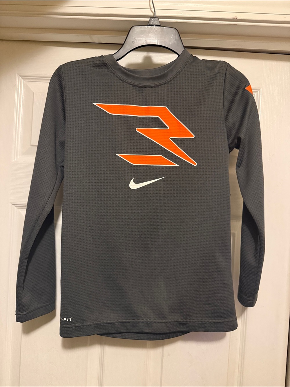 Nike Kids Gray Long-Sleeve Athletic Tee with Orange Graphic